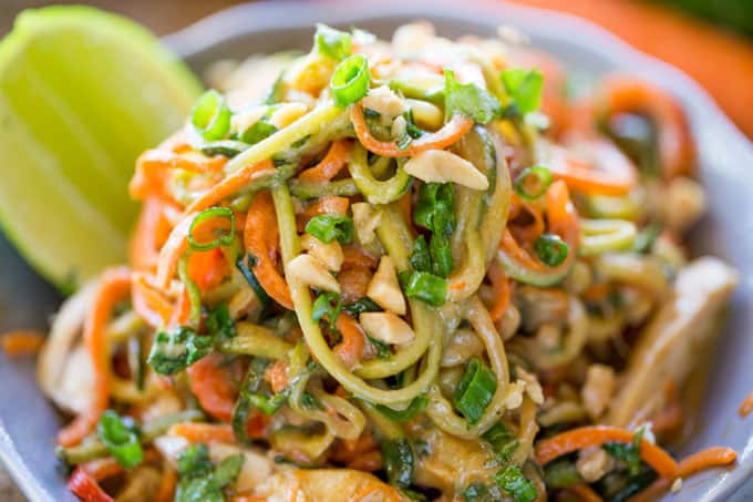 Healthy Thai Peanut Chicken Zucchini Noodles with a fresh peanut lime sauce mixed with veggie noodles makes a perfect light meal and lunch the next day!