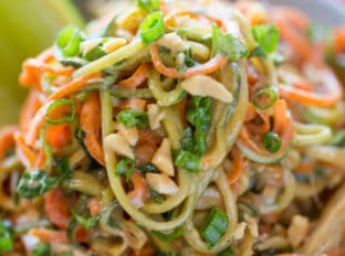 Healthy Thai Peanut Chicken Zucchini Noodles with a fresh peanut lime sauce mixed with veggie noodles makes a perfect light meal and lunch the next day!