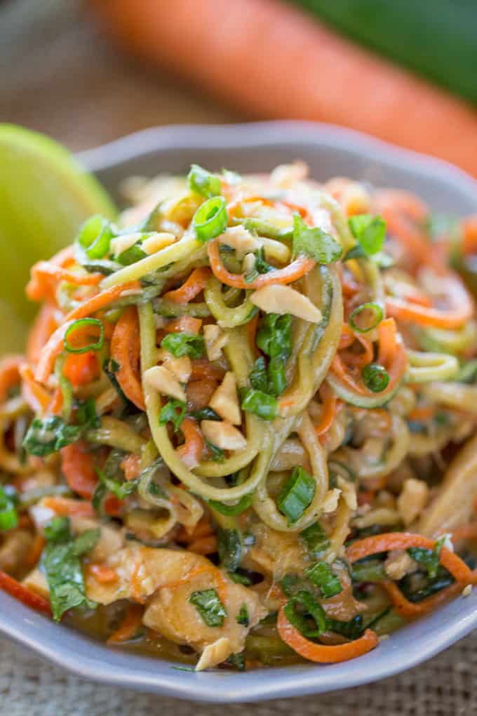 Healthy Thai Peanut Chicken Zucchini Noodles with a fresh peanut lime sauce mixed with veggie noodles makes a perfect light meal and lunch the next day!