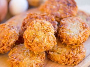 Perfect Potato Latkes with just a few ingredients and a bit of soaking time have the crispiest exteriors with the fluffiest centers. There won't be a single one left over.