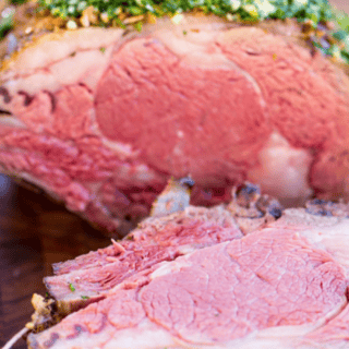 Sliced meat on cutting board