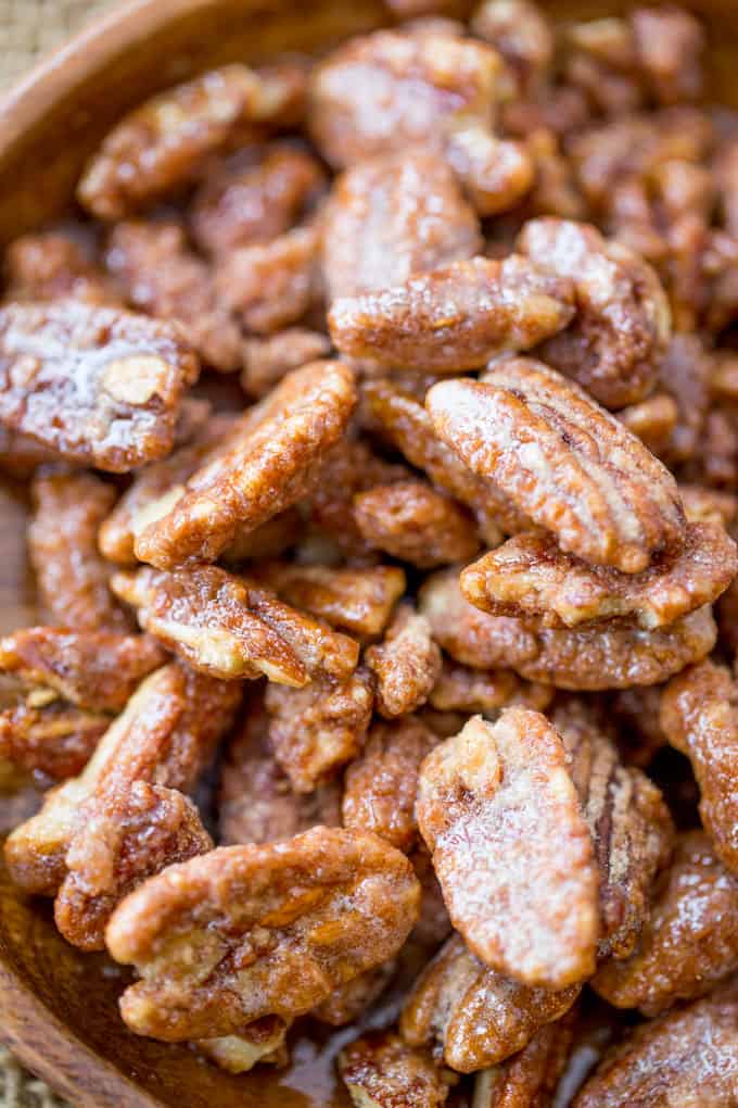 Slow Cooker Candied Cinnamon Pecans are a total breeze to make and will leave your house smelling absolutely delicious! Plus they double as amazing holiday gifts you can make in bulk!