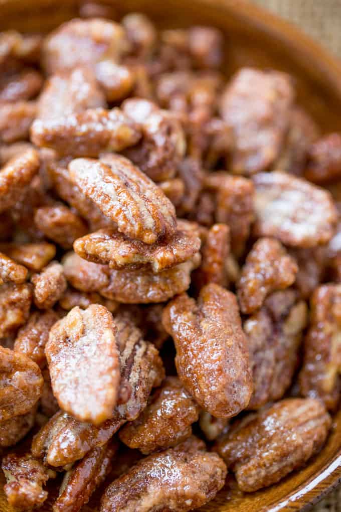 Slow Cooker Candied Cinnamon Pecans are a total breeze to make and will leave your house smelling absolutely delicious! Plus they double as amazing holiday gifts you can make in bulk!