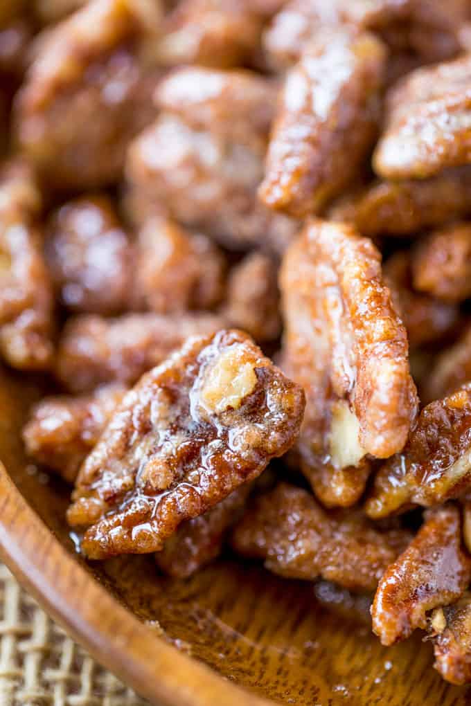 Slow Cooker Candied Cinnamon Pecans are a total breeze to make and will leave your house smelling absolutely delicious! Plus they double as amazing holiday gifts you can make in bulk!