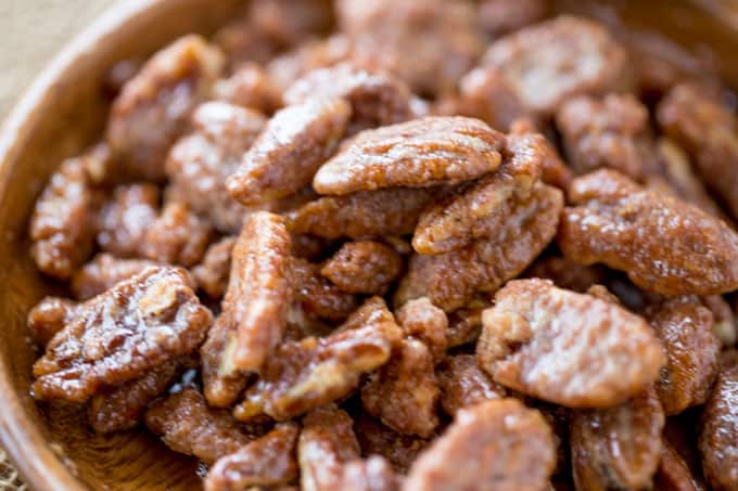 Slow Cooker Candied Cinnamon Pecans are a total breeze to make and will leave your house smelling absolutely delicious! Plus they double as amazing holiday gifts you can make in bulk!