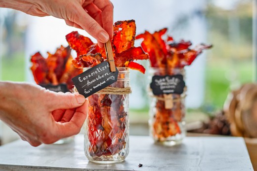 Spicy Sweet Bacon Wrapped Pineapple Bites caramelized with brown sugar and hot sauce make a perfect sticky, sweet, spicy, fruity bacon bite your guest will love in just minutes!