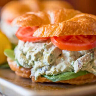 Chicken salad in a croissant with tomato and lettuce 4x3