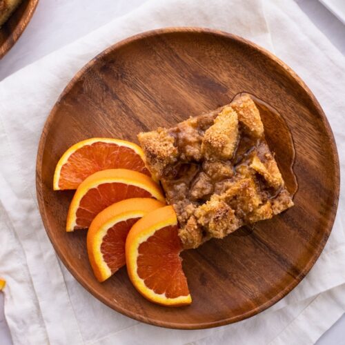 Square of French Toast with orange slices