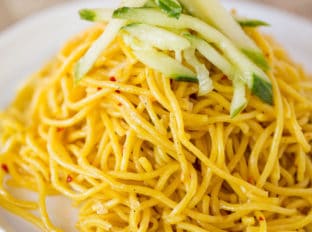 P.F. Chang's Garlic Noodles are a quick and easy Chinese noodle dish copycat dish you can make without the heavy flavors of a chow mein and as the perfect base for your favorite stir fry meals.
