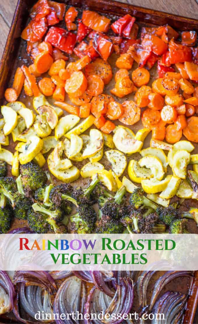 Tray of rainbow roasted vegetables including zucchini and carrots.