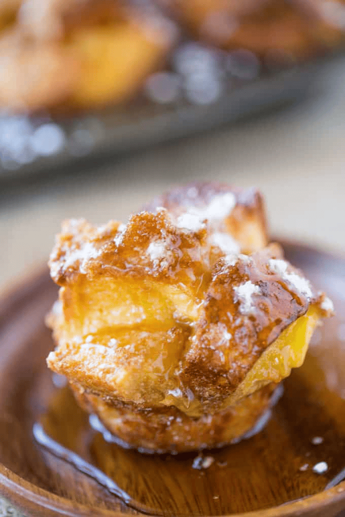 Toasted muffin on a wooden plate