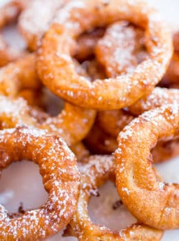 Apple Fritter Rings made with a pancake batter without yeast come together in just a few minutes and are the perfect sweet treat to end a meal or breakfast for kids who love donuts.