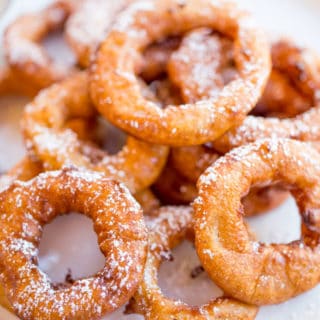Apple Fritter Rings made with a pancake batter without yeast come together in just a few minutes and are the perfect sweet treat to end a meal or breakfast for kids who love donuts.