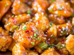 Asian Sweet Chili Chicken is so crispy, sticky, sweet, slightly spicy and completely addicting you won't even miss your favorite Asian takeout.