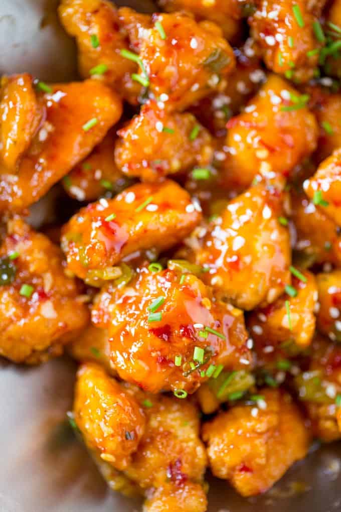 Asian Sweet Chili Chicken is so crispy, sticky, sweet, slightly spicy and completely addicting you won't even miss your favorite Asian takeout.