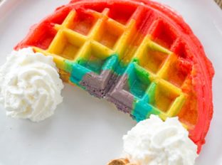 Belgian Rainbow Waffles will make your St. Patrick's Day Breakfast a hit with homemade Belgian waffles turned into beautiful rainbows with a pot o' gold.