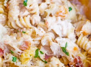 Chicken Bacon Ranch Pasta Bake is an easy casserole with creamy alfredo sauce with ranch flavors, chicken, bacon and pasta all baked together for a perfect weeknight meal.