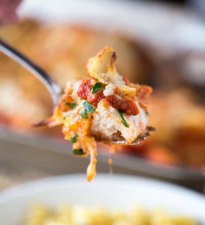 Chicken Parmesan Casserole is a quick weeknight meal that is ready to bake in ten minutes with mozzarella, Parmesan, tomato sauce and a crouton crunch topping for the perfect Chicken Parmesan flavor! 