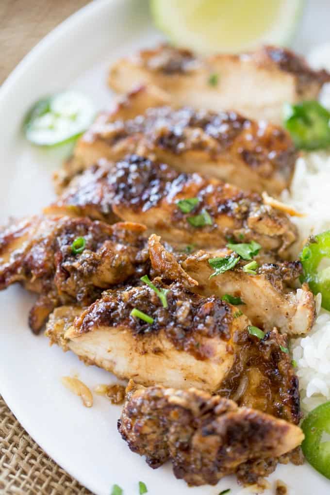 Easy Grilled Jerk Chicken made with a marinade that takes just a few seconds to make is the most flavorful authentic Jamaican chicken you'll grill all summer!