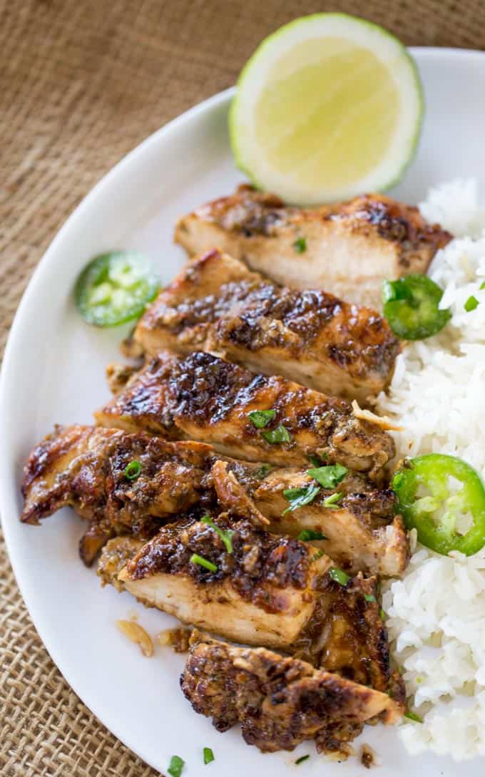 Easy Grilled Jerk Chicken made with a marinade that takes just a few seconds to make is the most flavorful authentic Jamaican chicken you'll grill all summer!