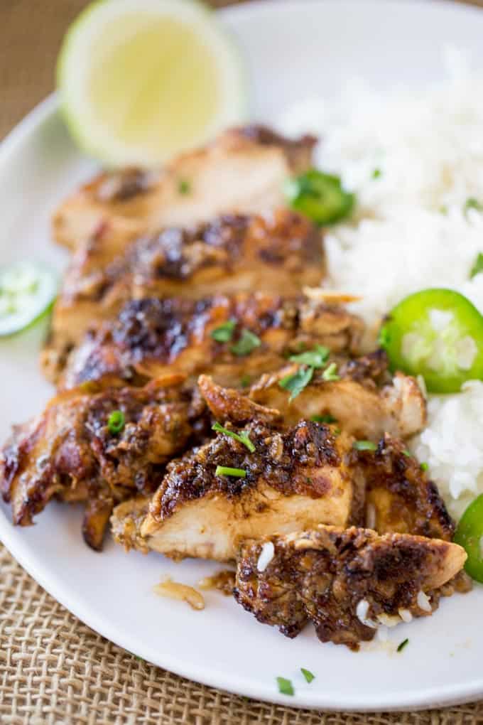 Easy Grilled Jerk Chicken made with a marinade that takes just a few seconds to make is the most flavorful authentic Jamaican chicken you'll grill all summer!