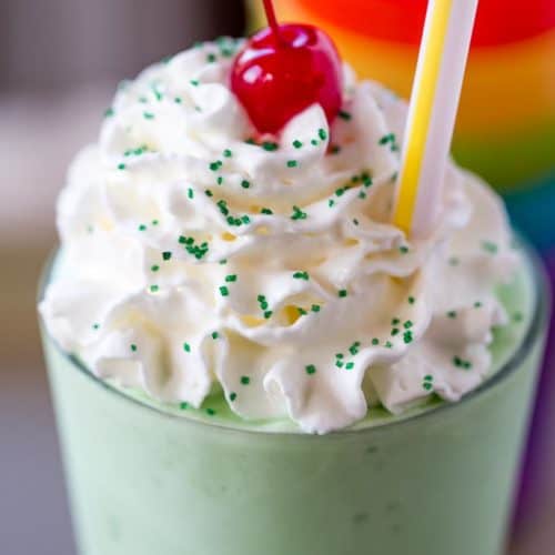 McDonald's Shamrock Shake is the homemade version of the classic St. Patrick's day treat made with vanilla ice cream, mint extract, whipped cream and a cherry.