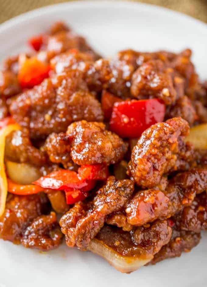 Panda Express Beijing Beef is an awesome copycat of the original with crispy strips of marinated beef, bell peppers and sliced onions, tossed in the wok with a tangy sweet and spicy sauce.