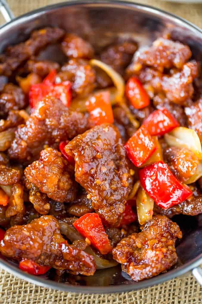 Panda Express Beijing Beef is an awesome copycat of the original with crispy strips of marinated beef, bell peppers and sliced onions, tossed in the wok with a tangy sweet and spicy sauce.