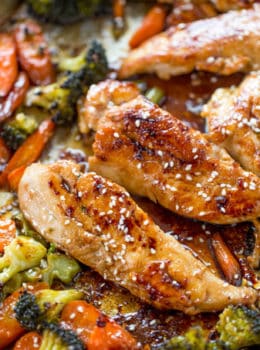 Sheet Pan Korean Chicken and Vegetables are a delicious and easy weeknight meal that cooks in one pan and makes crispy tender vegetables and moist sweet and garlicky chicken.
