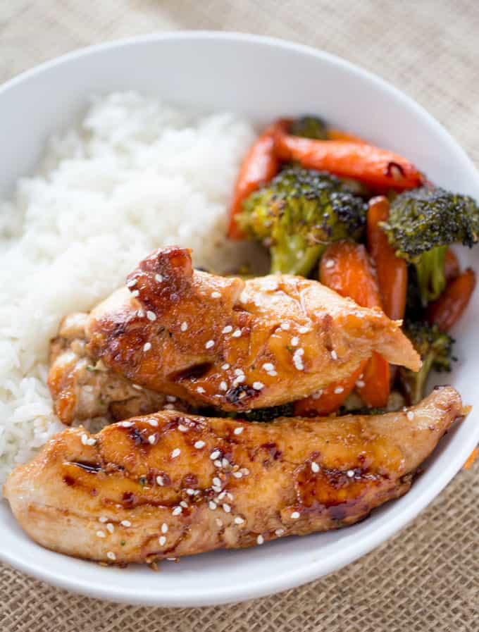 Sheet Pan Korean Chicken and Vegetables are a delicious and easy weeknight meal that cooks in one pan and makes crispy tender vegetables and moist sweet and garlicky chicken.