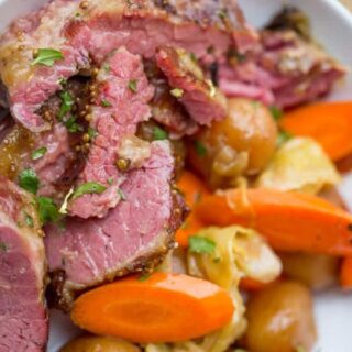 sliced beef with potatoes and carrots