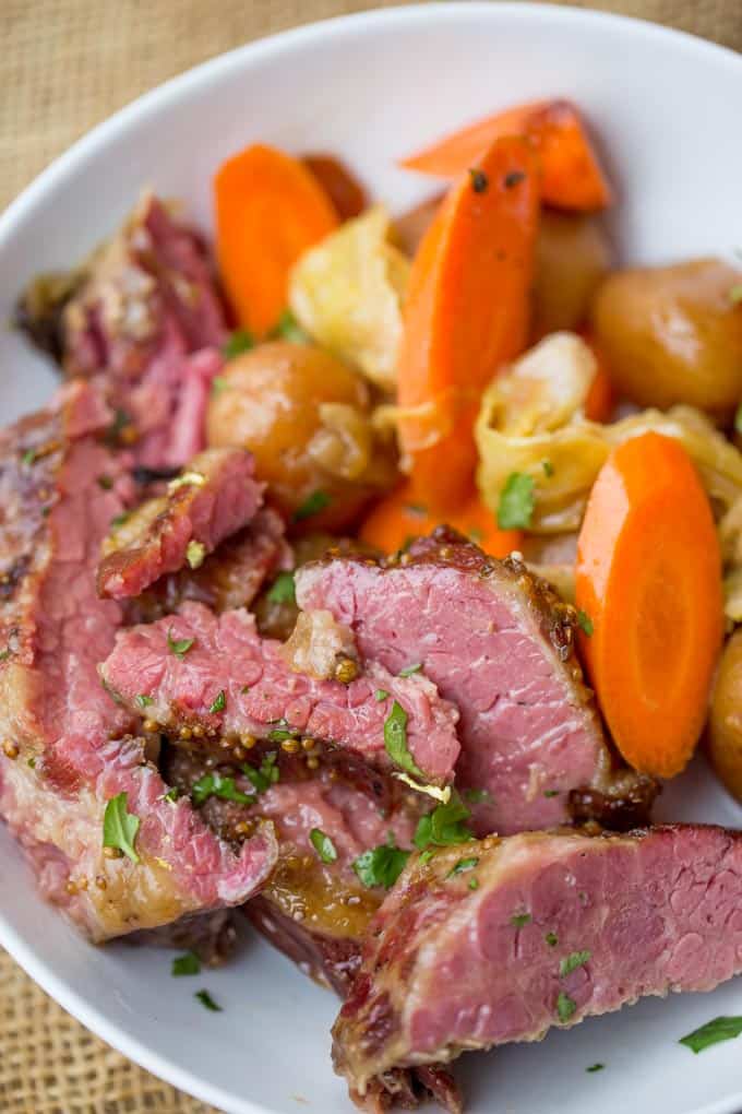 Slow Cooker Corned Beef Dinner all made in one pot with cabbage, potatoes and carrots for the perfect easy St. Patrick's Day dinner you can just set and forget.