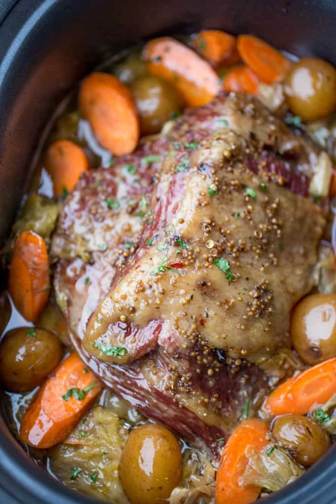 Slow Cooker Corned Beef Dinner all made in one pot with cabbage, potatoes and carrots for the perfect easy St. Patrick's Day dinner you can just set and forget.