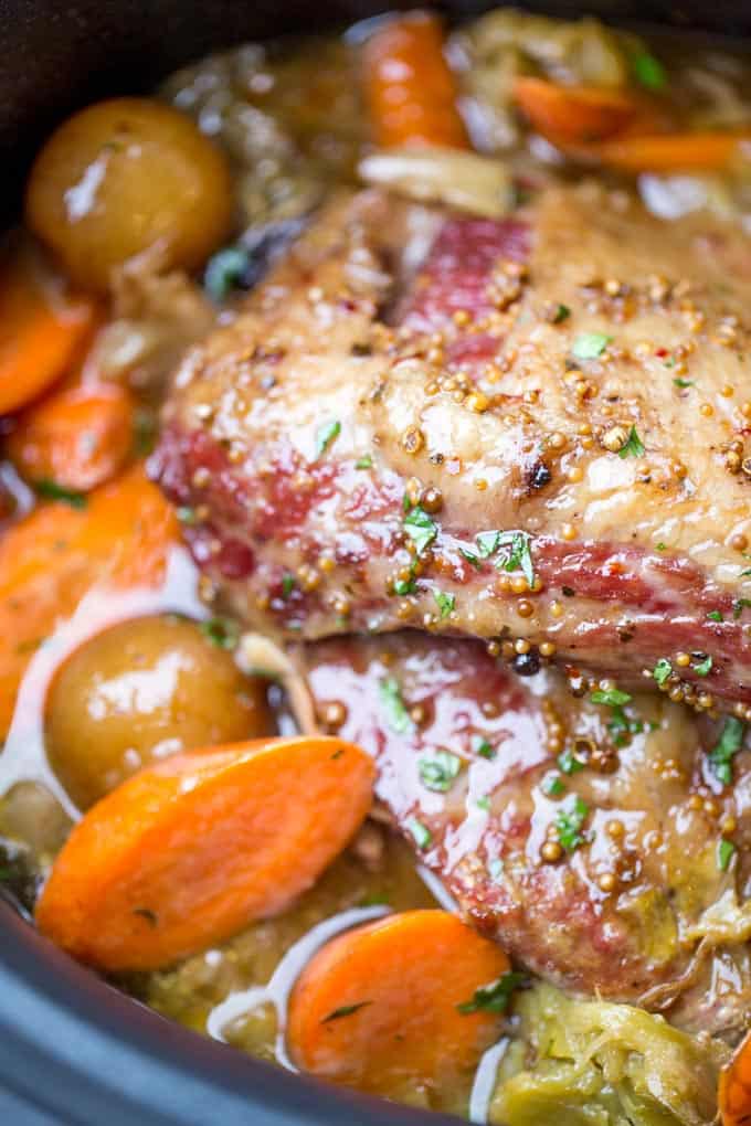 Slow Cooker Corned Beef Dinner all made in one pot with cabbage, potatoes and carrots for the perfect easy St. Patrick's Day dinner you can just set and forget.