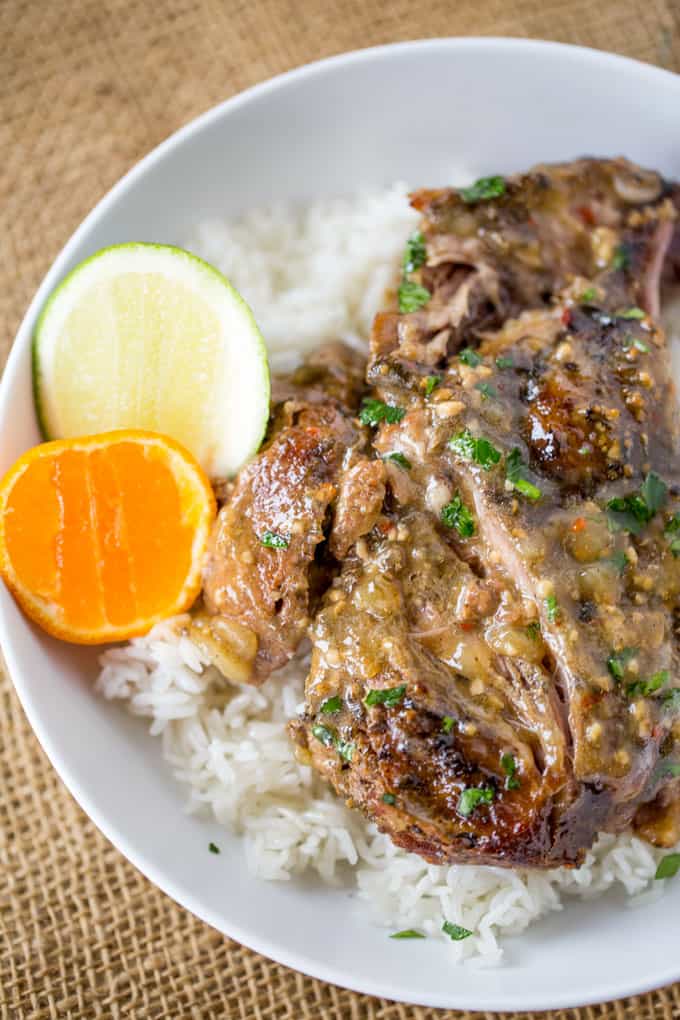 Slow Cooker Cuban Mojo Pork made with citrus, garlic, oregano and cumin takes almost no prep time and makes a fantastic, flavorful meal your family will love any night of the week!