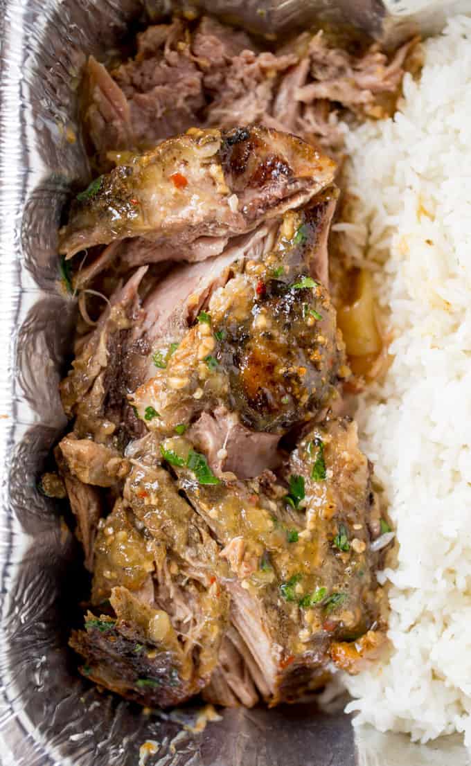 Slow Cooker Cuban Mojo Pork made with citrus, garlic, oregano and cumin takes almost no prep time and makes a fantastic, flavorful meal your family will love any night of the week!