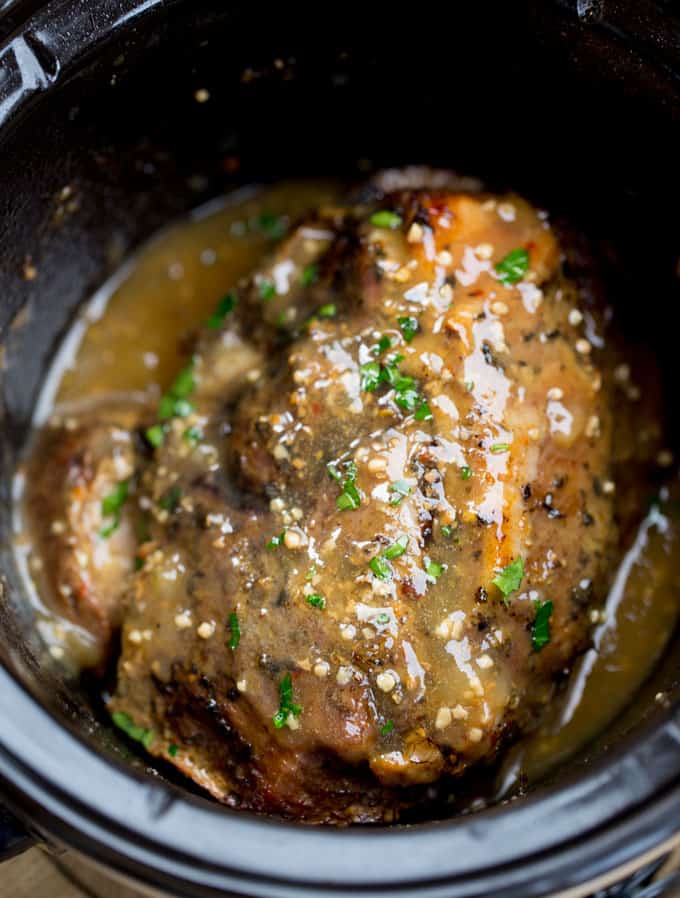 Slow Cooker Cuban Mojo Pork made with citrus, garlic, oregano and cumin takes almost no prep time and makes a fantastic, flavorful meal your family will love any night of the week!