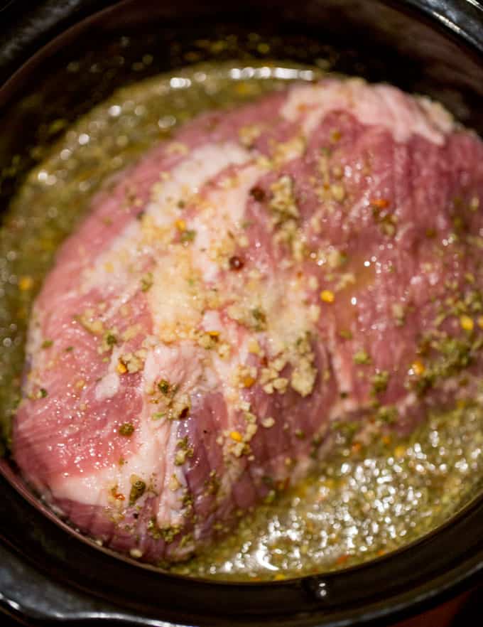 Slow Cooker Cuban Mojo Pork made with citrus, garlic, oregano and cumin takes almost no prep time and makes a fantastic, flavorful meal your family will love any night of the week!