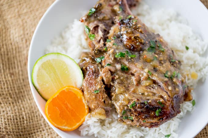 Slow Cooker Cuban Mojo Pork made with citrus, garlic, oregano and cumin takes almost no prep time and makes a fantastic, flavorful meal your family will love any night of the week!