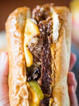Slow Cooker Philly Cheese Steak Sandwiches that are so tender and flavorful you'll feel like you're in Philly. Perfect for a crowd!