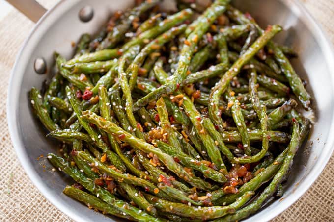 Spicy Chinese Sichuan Green Beans are the perfect easy side dish to your favorite Chinese meal and they're a breeze to make with just a few ingredients.