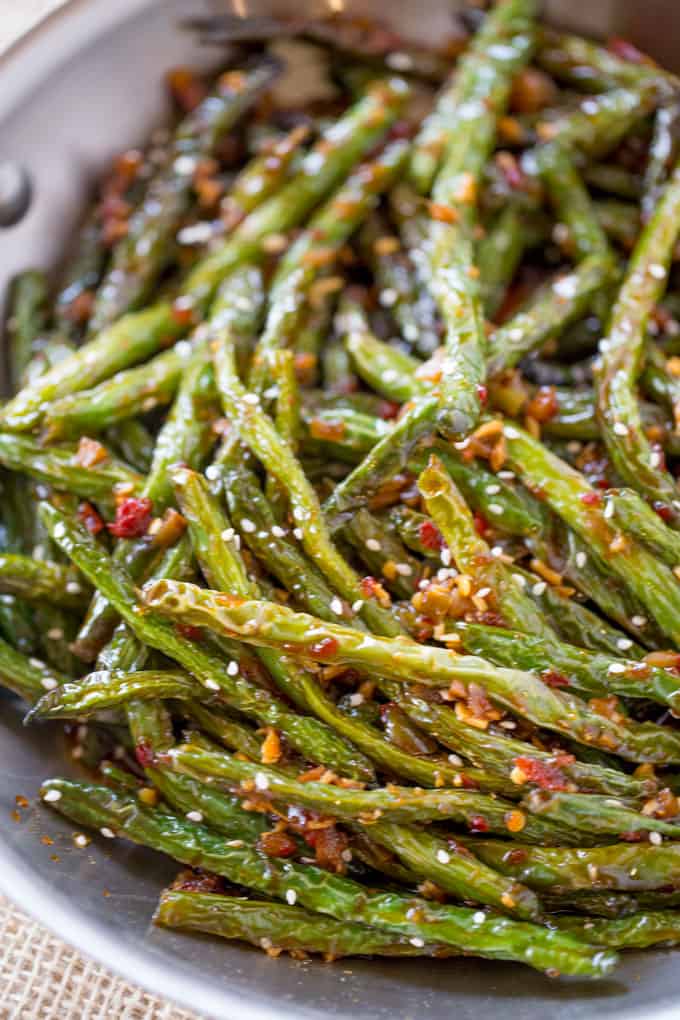 Spicy Chinese Sichuan Green Beans are the perfect easy side dish to your favorite Chinese meal and they're a breeze to make with just a few ingredients.
