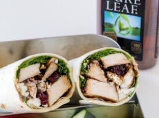 Balsamic Chicken Goat Cheese Wraps made with balsamic roasted chicken breasts, arugula, pecans, cranberries and goat cheese and topped with a wonderful balsamic glaze. The perfect lunch on the go.