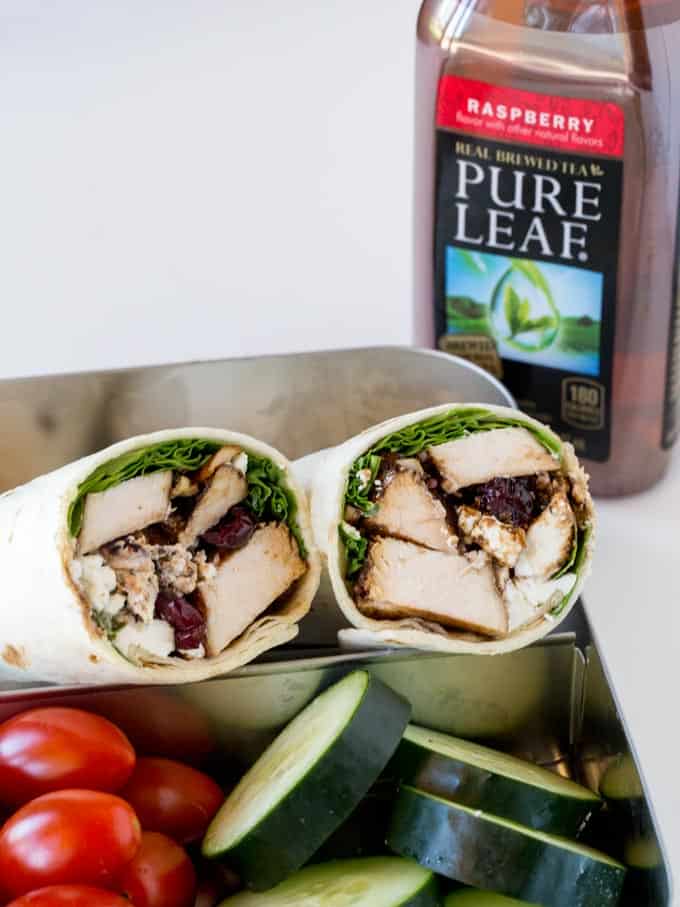 Balsamic Chicken Goat Cheese Wraps made with balsamic roasted chicken breasts, arugula, pecans, cranberries and goat cheese and topped with a wonderful balsamic glaze. The perfect lunch on the go.