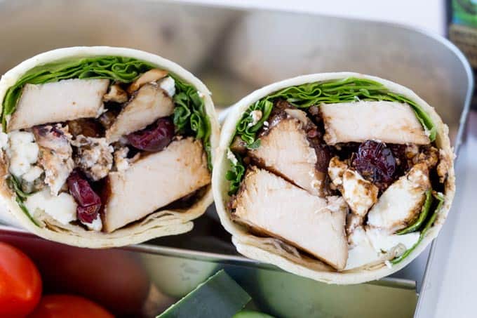 Balsamic Chicken Goat Cheese Wraps made with balsamic roasted chicken breasts, arugula, pecans, cranberries and goat cheese and topped with a wonderful balsamic glaze. The perfect lunch on the go.