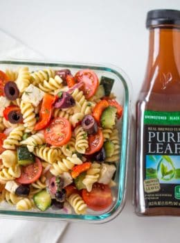 Easy Greek Pasta Salad with a homemade vinaigrette, pasta, feta, and olives is the perfect, easy lunch meal you can enjoy at room temperature. Also great with added chicken or shrimp.