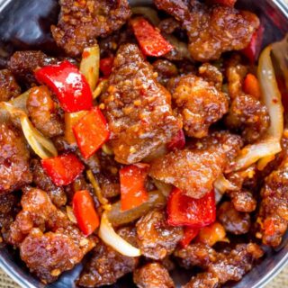 Beef cooked in pan, slightly zoomed out.