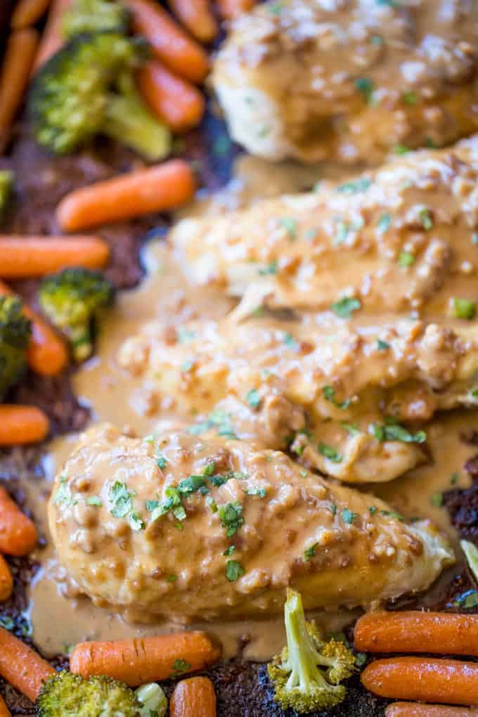 Sheet Pan Peanut Chicken and Vegetables is an easy, but authentic weeknight dinner with almost no cleanup! Serve with rice or noodles.