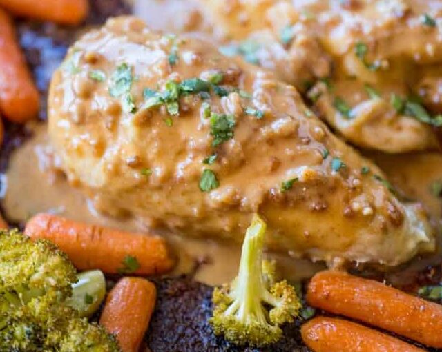 Sheet Pan Peanut Chicken and Vegetables is an easy, but authentic weeknight dinner with almost no cleanup! Serve with rice or noodles.