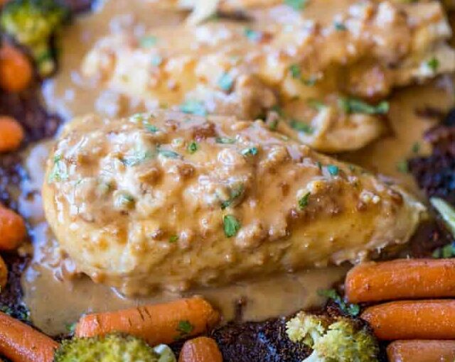 Sheet Pan Peanut Chicken and Vegetables is an easy, but authentic weeknight dinner with almost no cleanup! Serve with rice or noodles.